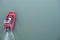 Red Boat From Above on Green River with Water Bubble Two People in Rome Italy 2013 Royalty Free Stock Photo