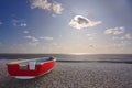 Red boat on beach Royalty Free Stock Photo
