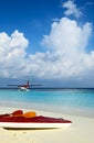 Red boat is on a beach Royalty Free Stock Photo