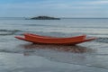 Red boat on the beach Royalty Free Stock Photo