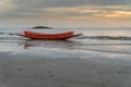 Red boat on the beach Royalty Free Stock Photo