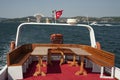 Red boat deck and the Turkish flag. Royalty Free Stock Photo