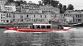 Red boat on douro river in porto port