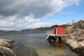 Red boat house at the sea Royalty Free Stock Photo