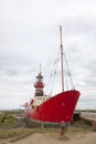 Red boat in marshes