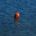 Red boat mooring off Psalidiou Beach Kos