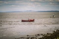 Red boat at Morecambe Bay in the North West of England