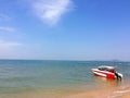 Red boat at the sea shore Royalty Free Stock Photo