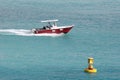 Red Boat Yellow Buoy Royalty Free Stock Photo