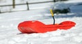 Red bob in the snow in the mountains Royalty Free Stock Photo