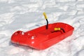 Red bob in the snow in the mountains Royalty Free Stock Photo