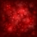 Red bokeh effect abstract background. Blurred backdrop. Festive defocused lights. Easy to edit design template Royalty Free Stock Photo