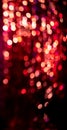 Red bokeh lights on a black background. background for the decor of the holiday congratulations. Space for text Royalty Free Stock Photo