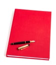 Red book with fountain pen Royalty Free Stock Photo