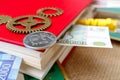 A red book with money sticking out of its page and RAM Royalty Free Stock Photo