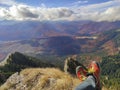 Red boots of a mountain climber in Romania Royalty Free Stock Photo