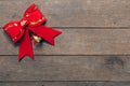 Red bow christmas on wood background with copyspace Royalty Free Stock Photo