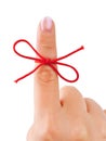 Red bow on finger Royalty Free Stock Photo