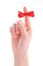 Red bow on finger Royalty Free Stock Photo