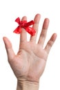 Red bow on finger Royalty Free Stock Photo