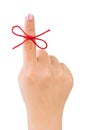 Red bow on finger Royalty Free Stock Photo