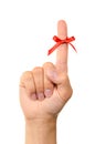 Red bow on finger Royalty Free Stock Photo