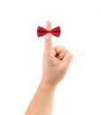 Red bow on finger. Royalty Free Stock Photo