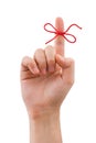 Red bow on finger Royalty Free Stock Photo