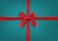 Red Bow Gift on turquoise background. Gift background