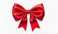 Red bow made of satin ribbon close-up. Royalty Free Stock Photo