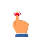 Red bow ribbon on hand on index finger Royalty Free Stock Photo