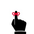 Red bow ribbon on hand on index finger silhouette Royalty Free Stock Photo