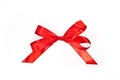 Red bow from ribbon with tails isolated