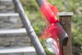 Red bow on wooden fance