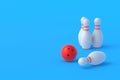 Red bowling ball and white pins on blue background Royalty Free Stock Photo