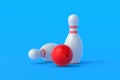 Red bowling ball and white pins on blue background Royalty Free Stock Photo