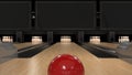 Red bowling ball on a wooden track with pins Royalty Free Stock Photo