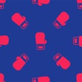 Red Boxing glove icon isolated seamless pattern on blue background. Vector Royalty Free Stock Photo