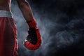 Red boxing glove on smoke backgrounds Royalty Free Stock Photo