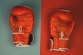 red boxing gloves on a red and blue background Royalty Free Stock Photo