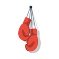 Red boxing gloves hanging. Gloves on a rope hang on the wall. Boxing icon. Royalty Free Stock Photo