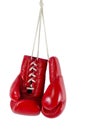 Red boxing gloves on white background