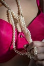 Red bra with pearls Royalty Free Stock Photo