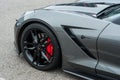 Red brake on black wheel of Chevrolet Corvette car parked in the street Royalty Free Stock Photo