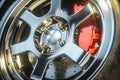 Red caliper brakes system and car wheel closeup. 3d render Royalty Free Stock Photo