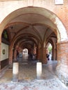 Red brick arcade in a square of Montauban in south west of France.