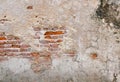 Red brick block wall texture old background ancient weathered brick wall with cracks and destroyed stucco layer. Royalty Free Stock Photo