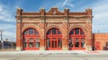 Red Brick Building With Arched Windows on Street Corner Royalty Free Stock Photo