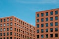 Red brick building blocks and blue sky - real estate  concept Royalty Free Stock Photo