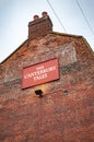 The red brick building of canterbury tales with signboard in kent county uk